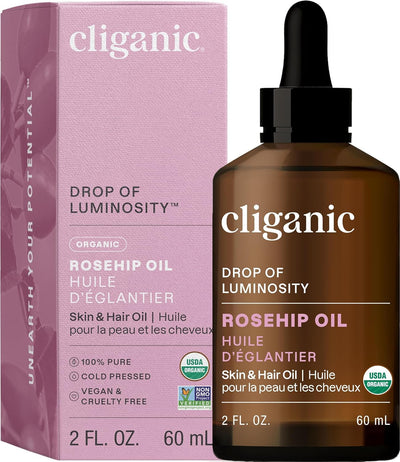 Cliganic Organic Rosehip Seed Oil 2 fl oz bottle with pink and brown packaging, 100% pure cold-pressed skin and hair oil, USDA organic certified, vegan and cruelty-free.