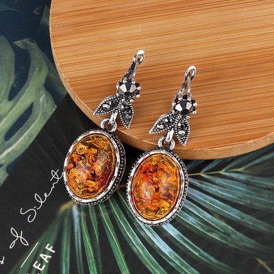 Geometric New Style Amber Retro Stud Earrings with antique silver electroplating and inlaid artificial gems.