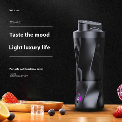 Portable electric juicer with black design for multifunctional kitchen use.