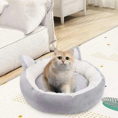 Soft pet bed with cat ear design, plush cushion, ideal for small to medium cats and dogs.