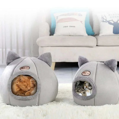 Pet bed with cat ears, plush and comfortable for warmth, suitable for small to large cats, machine washable.