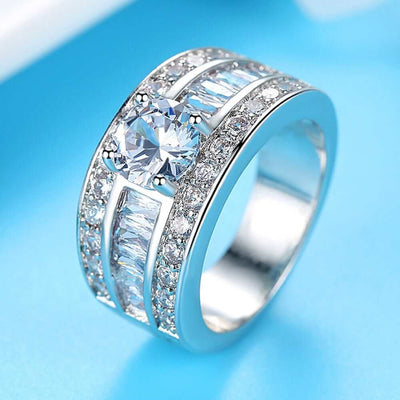 Silver fashion jewellery ring with zircon stones in geometric design, adjustable size for women