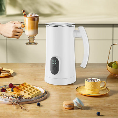 Home automatic stainless steel electric milk frother for hot and cold milk with button operation on kitchen table