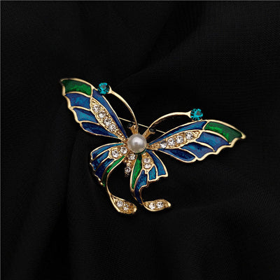 Retro Court Mid-ancient Style Western Enamel Butterfly Brooch with Crystals and Pearl on Black Fabric.