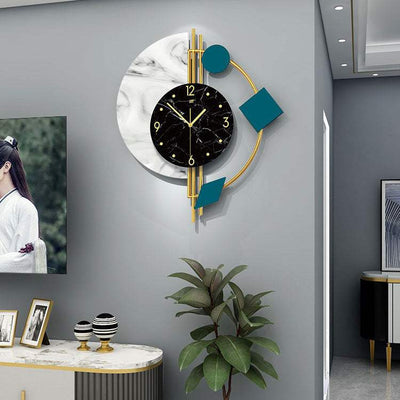Stylish quartz wall clock in living room decor with geometric design and metal frame.
