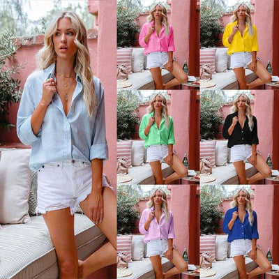 Woman wearing a lightweight simple button front shirt in various solid colors paired with white shorts