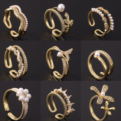 High-grade women's pearl rings with light luxury design, featuring electroplated copper in geometric and leaf shapes.
